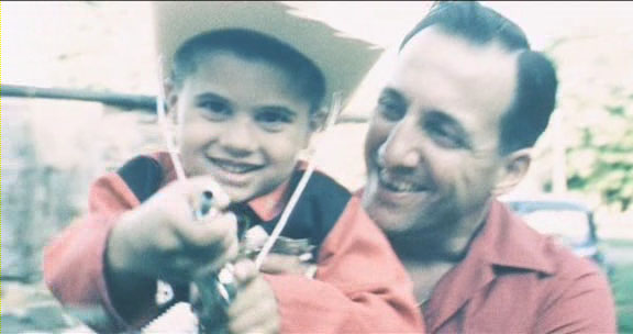 Young Paul Vittle and his dad